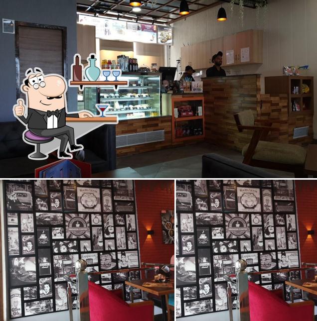 Take a seat at one of the tables at Barista - TDI Connaught Plaza