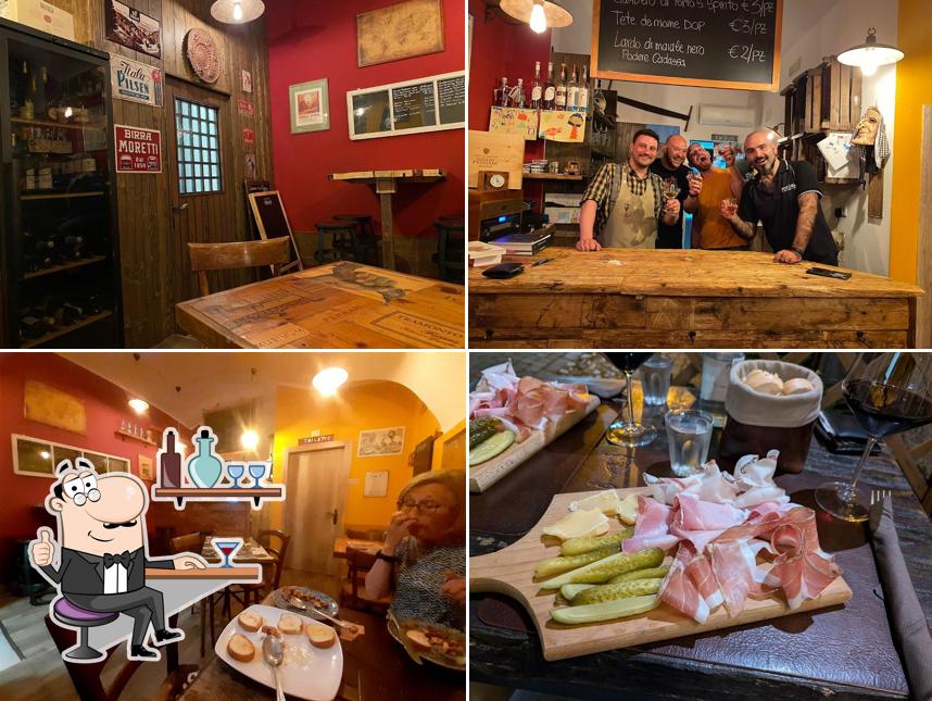 Dai un'occhiata agli interni di Osteria all'Ombra