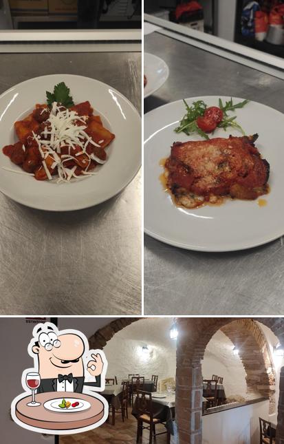 Questa è la foto che presenta la cibo e interni di L'antica Rupe