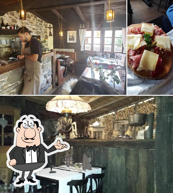 Siediti a un tavolo di Schäferstube Saas-Fee