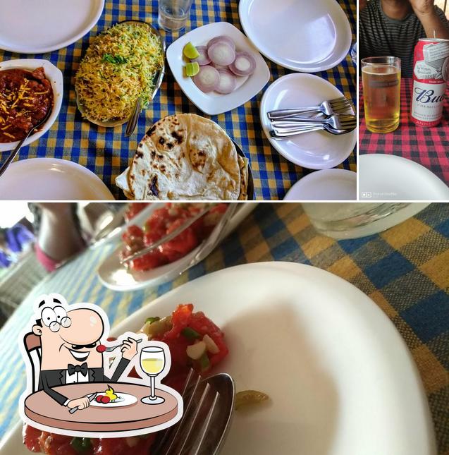 This is the photo depicting food and beer at Abhiksha Palace