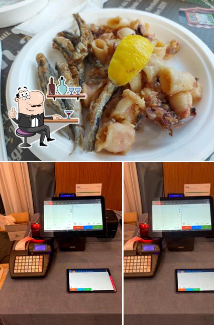 La foto della interni e cibo di Società Mutuo Soccorso fra Operai =Diritto e Doveri=