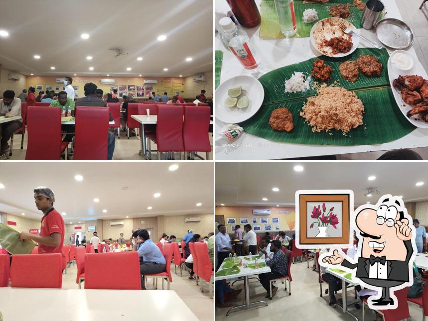 Take a seat at one of the tables at AMBUR STAR BRIYANI SINCE 1890