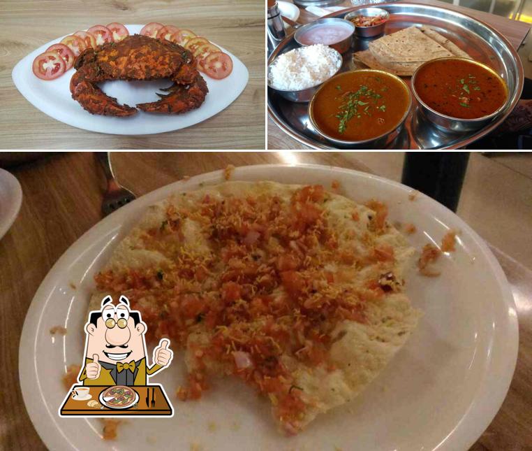 Try out pizza at Hotel Radhakrishna