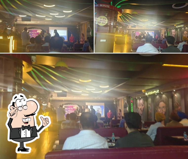 This is the picture showing interior and beverage at Glasshouz