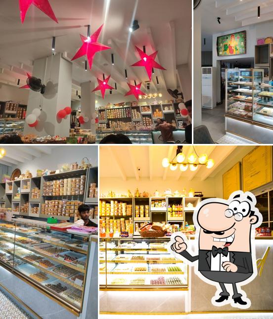 The interior of Swad - Sweet & Snacks
