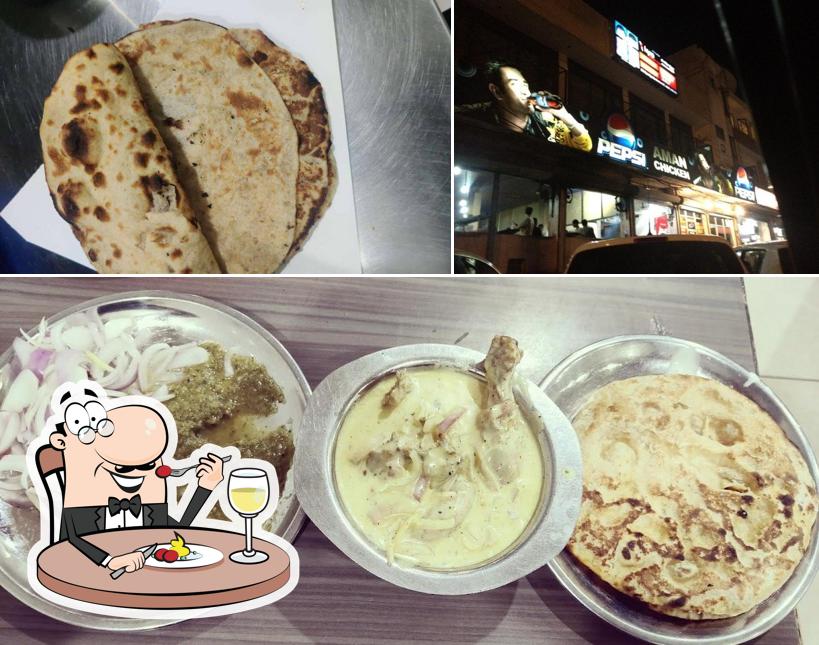 Check out the photo displaying food and exterior at Aman Chicken