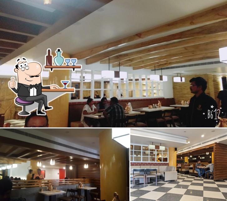 Take a seat at one of the tables at Jagavis Kritunga Train Restaurant