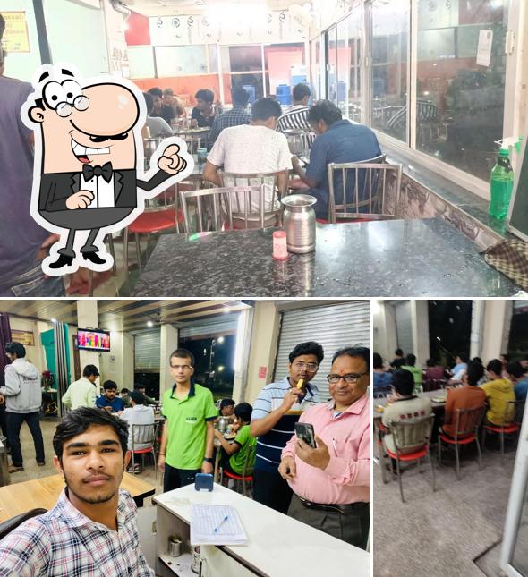 Take a seat at one of the tables at Laxmi Mess Kunhari