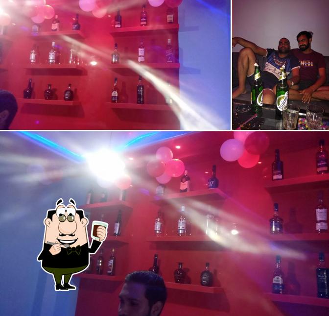 Enjoy a beverage at Santosh Bar