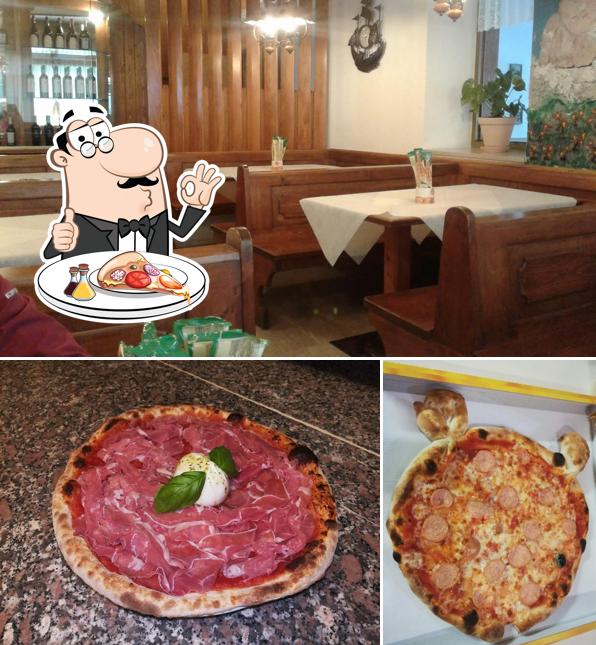 Scegli una pizza a Pizzeria Aquilotti