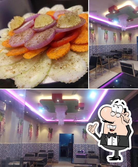 The interior of SRI SIDHI INN A/C FAMILY RESTAURANT