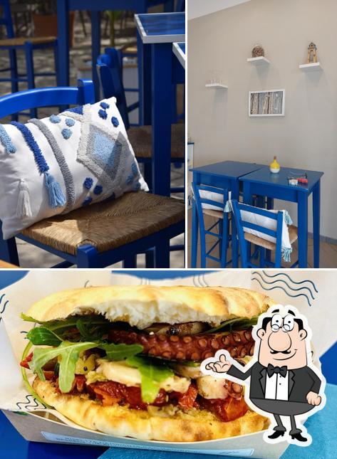 Guarda la foto che raffigura la interni e cibo di Amarè Fish Food