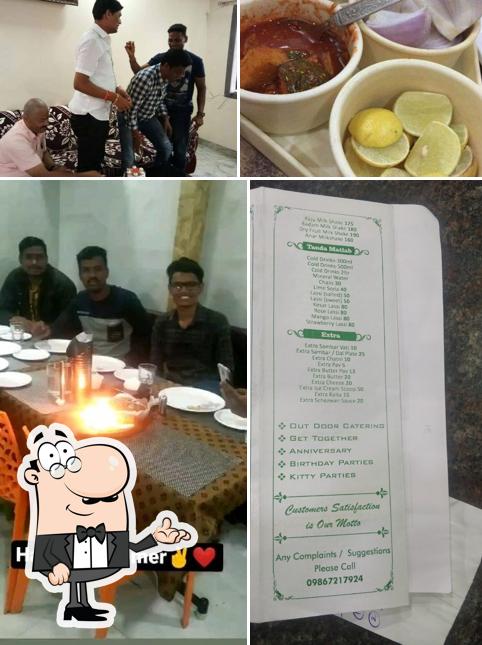 Take a seat at one of the tables at Shree Guruprasad Pure Veg