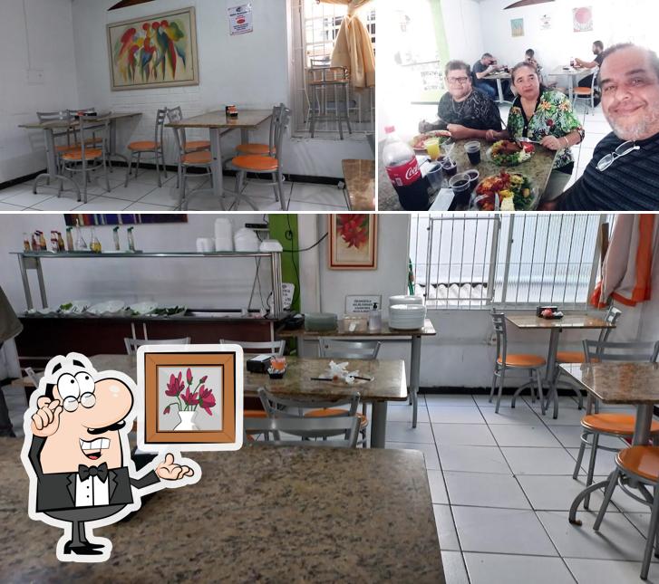 Esta é a foto ilustrando interior e mesa de jantar no Estilo Restaurante