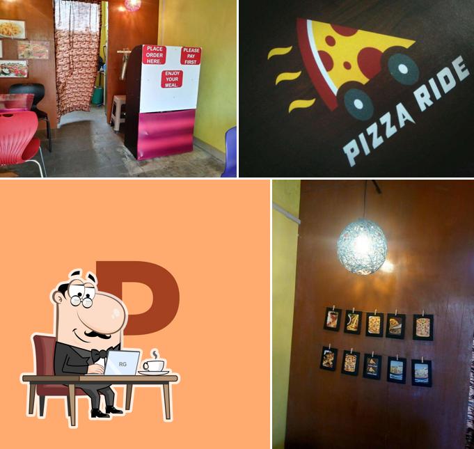 Take a seat at one of the tables at Pizza Ride