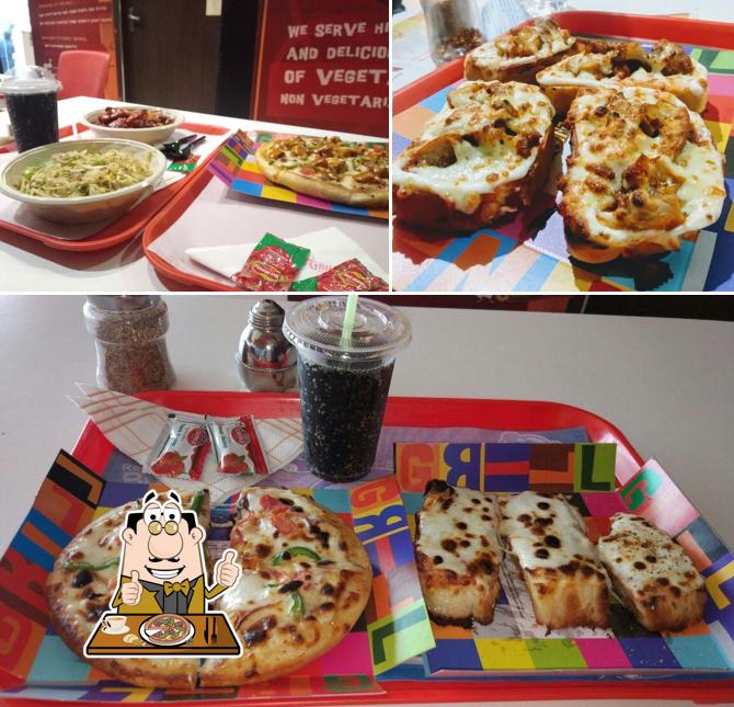 Get pizza at GRILL INN NIHARIKA