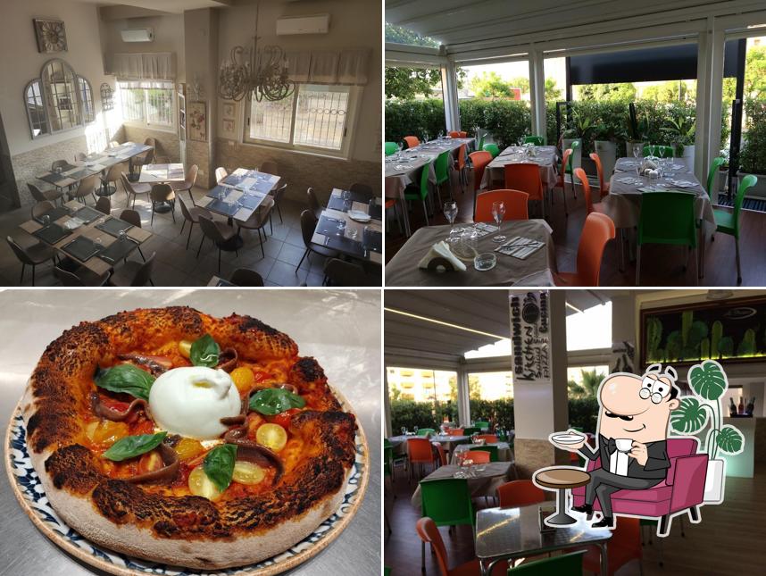 Dai un'occhiata agli interni di Pizzeria Ai Portici