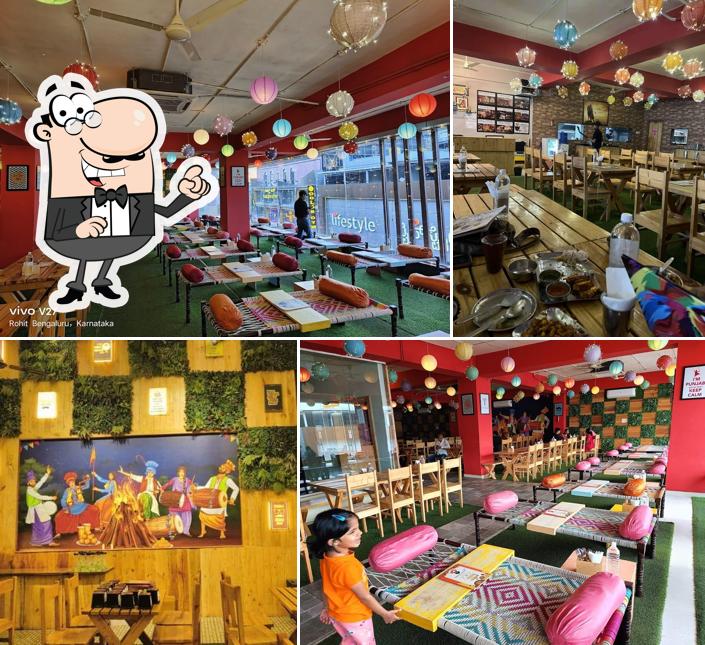 Take a seat at one of the tables at Kapoor's Cafe Electronic City