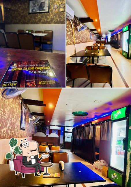 Take a seat at one of the tables at Abhiruchi Family Restaurant