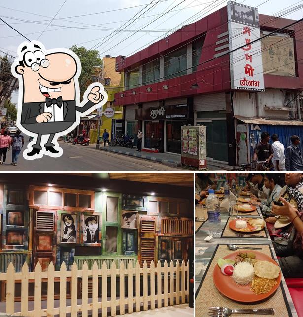 Among different things one can find exterior and dining table at Saptapadi Restaurant