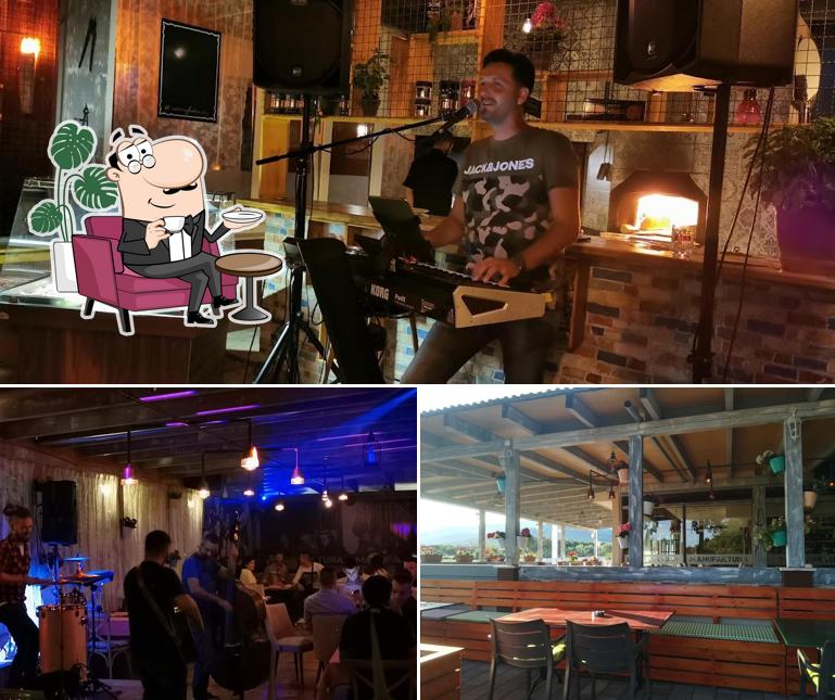Siediti a un tavolo di Manufaktura Restoran-Pivnica