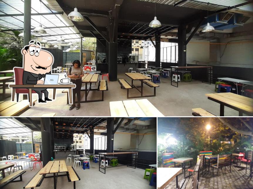 Take a seat at one of the tables at Cafe corner