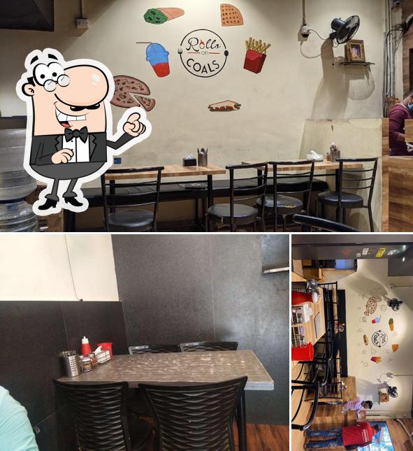 Take a seat at one of the tables at Rolls On Coals