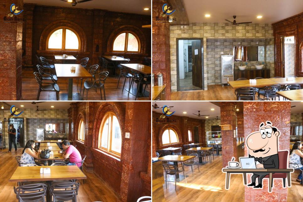 Take a seat at one of the tables at Bapa Sitaram The Valley Restaurant (Pure Veg)