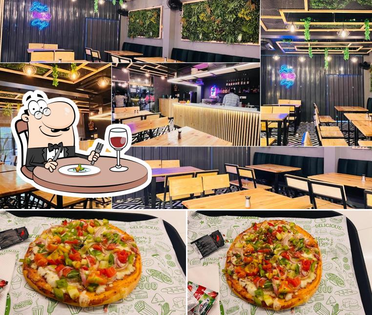 The image of food and interior at THE PLUTO CAFE