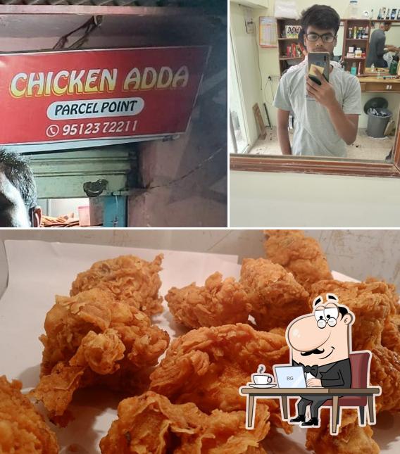 Among different things one can find interior and food at Chicken adda