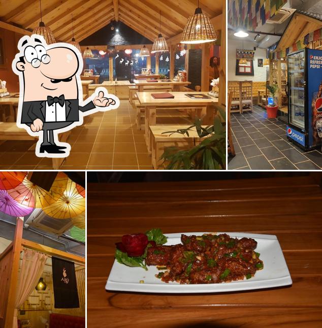 Take a seat at one of the tables at Kalsang Restaurant