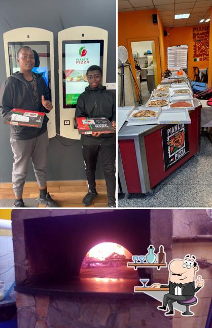 Gli interni di Pianeta Pizza