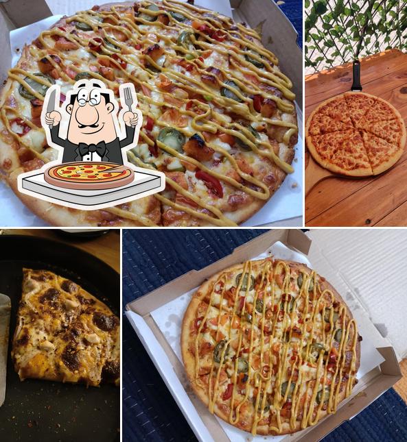 Try out pizza at The Lone Wolf Cafe