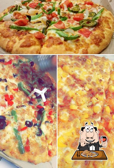 Try out pizza at Domino's Pizza Nai Dhan Mandi, Kota