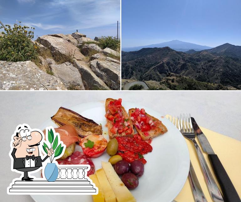 La foto di esterno e cibo da Ristorante Casa del Pellegrino - Affitta camere