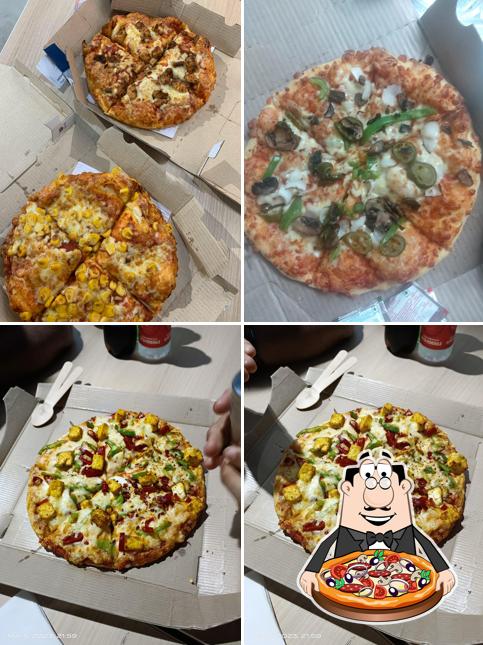 Pick pizza at Domino's Pizza