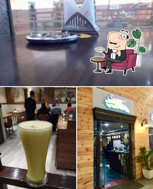 The photo of interior and beverage at Sagar Ratna