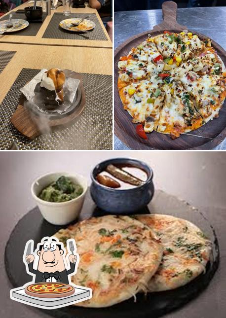 Get pizza at Anise pure veg Restaurant-