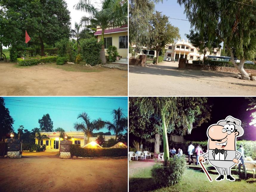 You can get some fresh air at the outside area of Holiday Green Restaurant