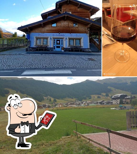 La foto della esterno e vino di Ristorante Pizzeria La Locanda