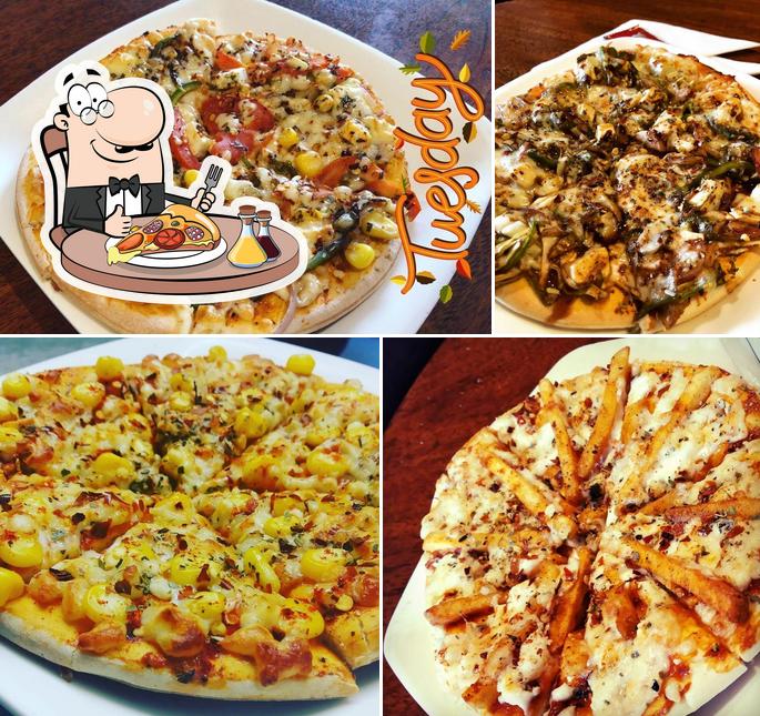 Order pizza at Mother India cafe