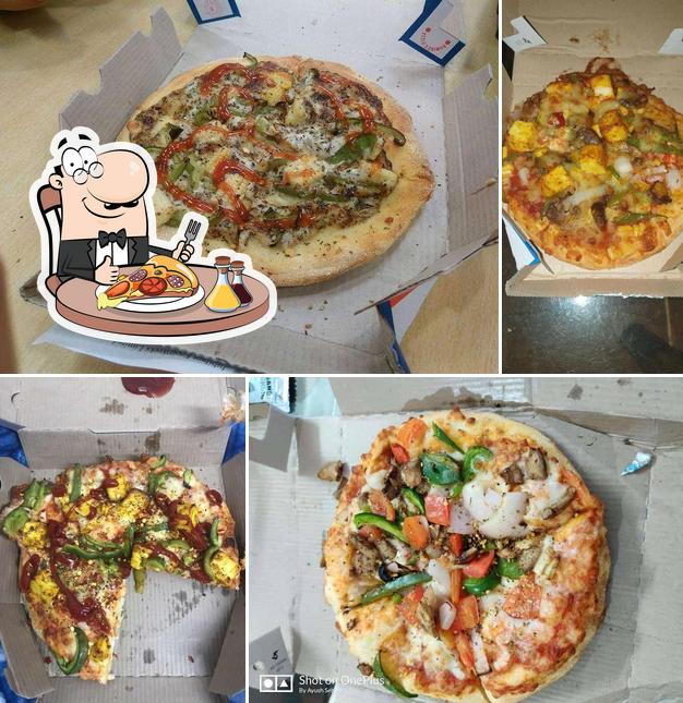 Try out pizza at Domino's Pizza