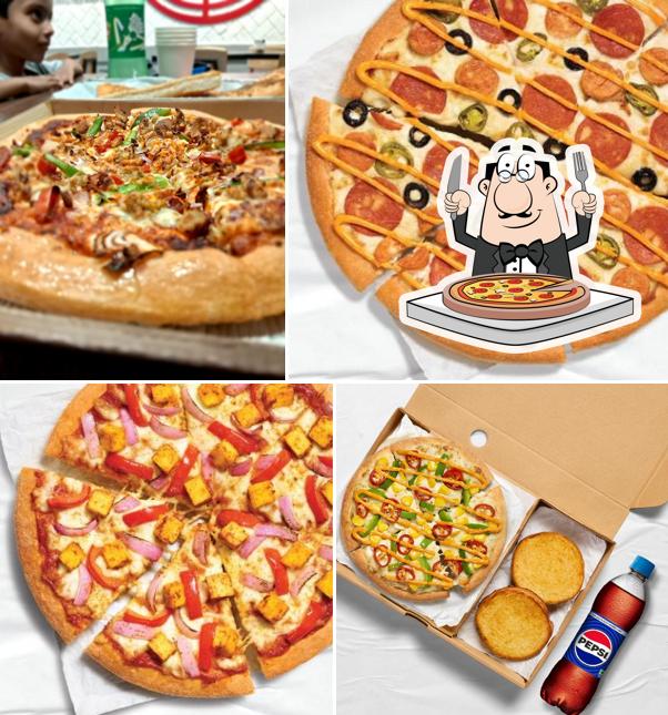 Try out pizza at Pizza Hut Hala Mall Puthanathani, Malappuram