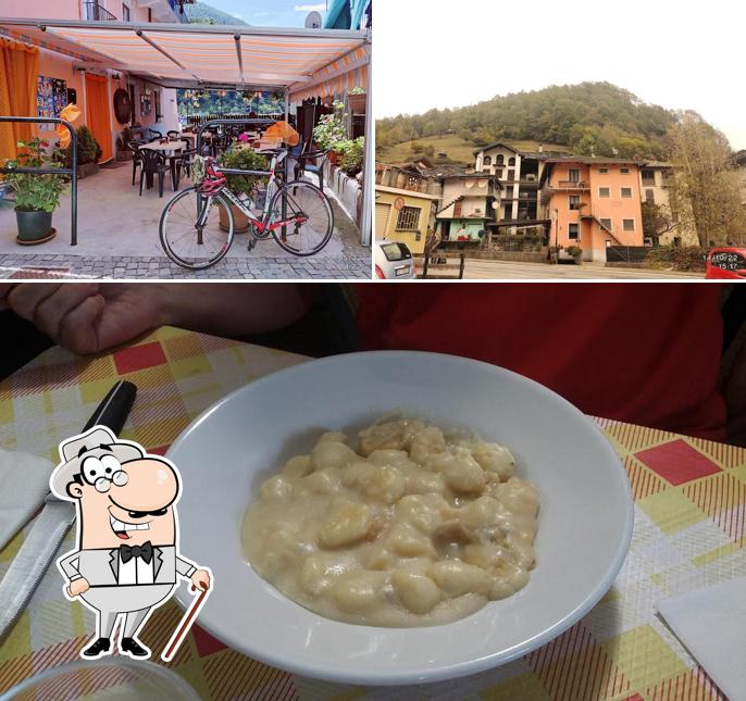 Questa è la foto che mostra la esterno e cibo di Bar Trattoria Osteria L'Circul