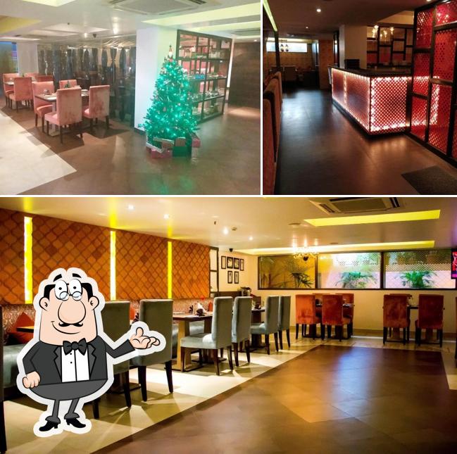 Take a seat at one of the tables at Moti Mahal Delux Tandoori Trail