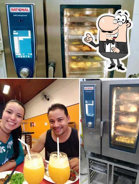 Sente em uma das mesas no Restaurante Milani