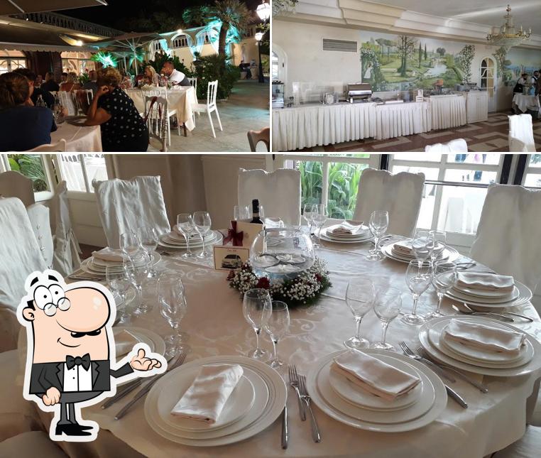 Siediti a un tavolo di Hotel Ristorante Villa Margherita
