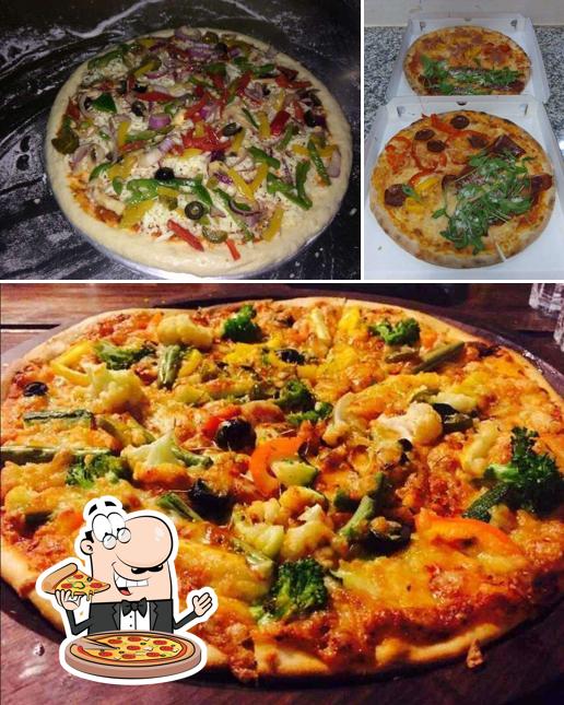 Get pizza at Tiny Treats