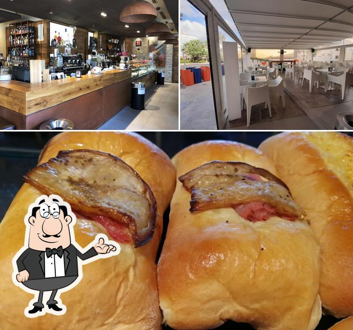 Questa è la immagine che raffigura la interni e cibo di MOMA Cafè